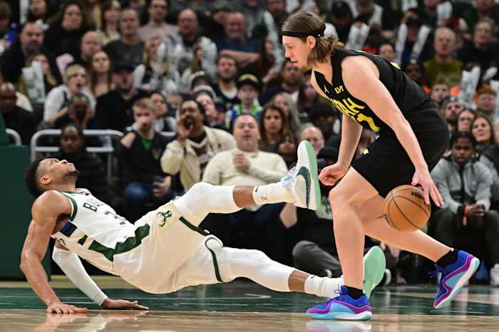 Utah Jazz forward Kelly Olynyk (41) and Milwaukee Bucks forward Giannis Antetokounmpo (34)